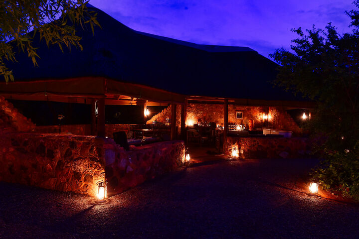 The Mosetlha Bush Camp in the evening, lit up by lanterns